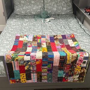 Large baby quilt ~ handmade bright vibrant colors 
Approximately 41 x 34 inches